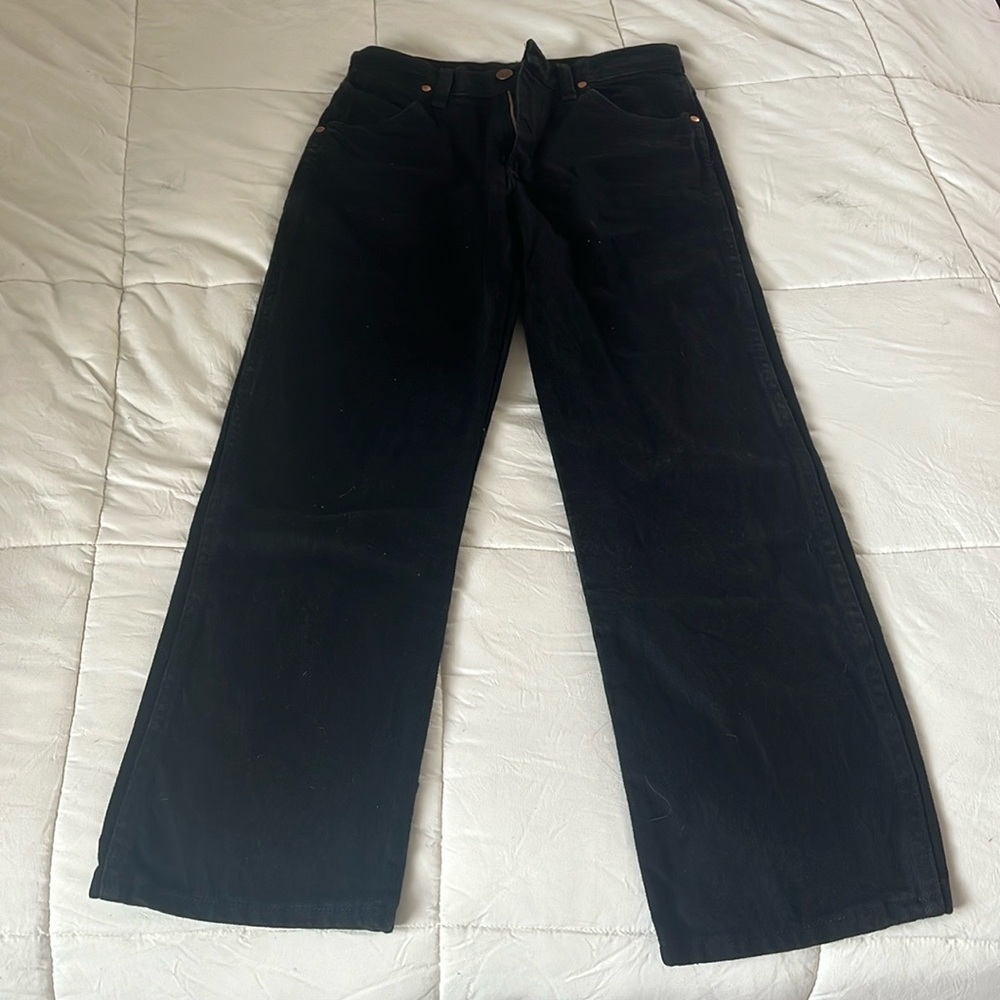Black straight-leg Wrangler jeans